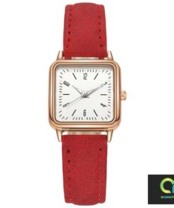 red ladies watch in a square golden frame