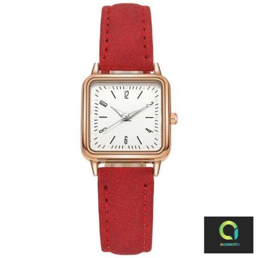red ladies watch in a square golden frame
