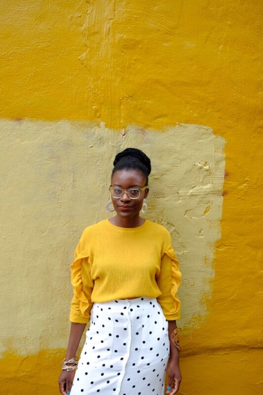 woman in yellow with accessories